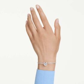 Symbolica Bangle Round Cut, Pavé, Horse Shoe, Blue, Rhodium Plated Symbolica Bangle Round Cut, Pavé, Horse Shoe, Blue, Rhodium Plated