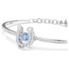 Symbolica Bangle Round Cut, Pavé, Horse Shoe, Blue, Rhodium Plated Symbolica Bangle Round Cut, Pavé, Horse Shoe, Blue, Rhodium Plated